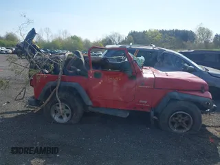 2004 Jeep Wrangler Sport with VIN 1J4FA49S14P803149, listed as a IAAI auction lot 42022481 with Not Provided miles. Bid and sale history available at carsss.com. Image 13.