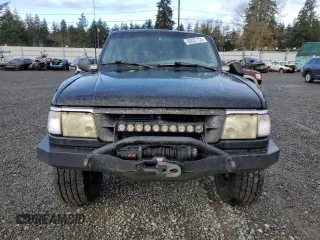 1997 Ford Ranger XLT with VIN 1FTCR15X8VPB38589, listed as a Copart auction lot 80037124 with 212,826 mi miles and Salvage Title. Bid and sale history available at DreamBid. Image 5.