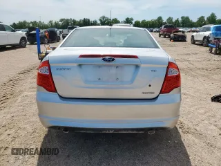 2012 Ford Fusion SE z VIN 3FAHP0HG8CR145183, wystawiony jako Copart lot #58627705 z przebiegiem 236 148 mil mil oraz Szkoda całkowita • Salvage title. Historia ofert i sprzedaży dostępna na DreamBid. Obrazek 6.
