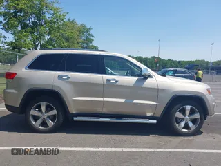 2014 Jeep Grand Cherokee Limited with VIN 1C4RJFBG9EC280315, listed as a IAAI auction lot 42400346 with 103,564 mi miles and . Bid and sale history available at DreamBid. Image 13.