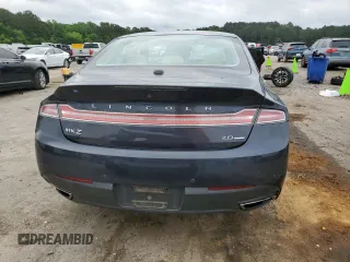 2013 Lincoln MKZ с VIN 3LN6L2G99DR808561, выставлен на аукционе Copart как лот 56287405 с пробегом 130 534 миль миль и Списание • Salvage title. История ставок и продаж доступна на DreamBid. Изображение 6.