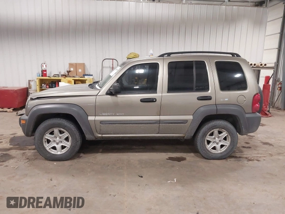 2003 Jeep Liberty Sport with VIN 1J4GL48K83W652993, listed as a IAAI auction lot 41086140 with 115,177 mi miles and . Bid and sale history available at DreamBid. Image 14.