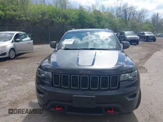 2017 Jeep Grand Cherokee Trailhawk with VIN 1C4RJFLG3HC674489, listed as a IAAI auction lot 42049006 with 91,892 mi miles and . Bid and sale history available at DreamBid. Image 13.