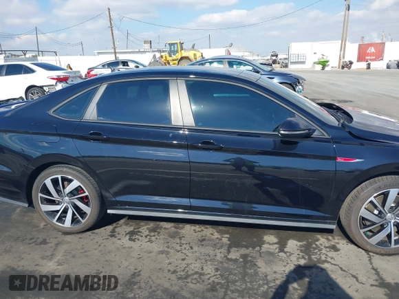 2021 Volkswagen Jetta GLI S with VIN 3VW6T7BU7MM002015, listed as a IAAI auction lot 41349898 with 44,416 mi miles and . Bid and sale history available at DreamBid. Image 14.