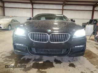 2015 BMW 6 Series 640i xDrive z VIN WBA6B8C58FD453159, wystawiony jako Copart lot #88931285 z przebiegiem 145 656 mil mil oraz Szkoda całkowita • Salvage title. Historia ofert i sprzedaży dostępna na DreamBid. Obrazek 5.