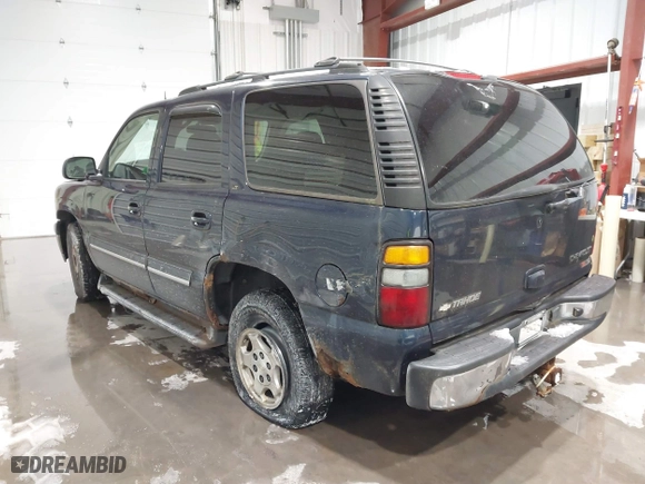 2004 Chevrolet Tahoe LT with VIN 1GNEK13T14J195982, listed as a IAAI auction lot 41589336 with 244,854 mi miles. Bid and sale history available at carsss.com. Image 3.