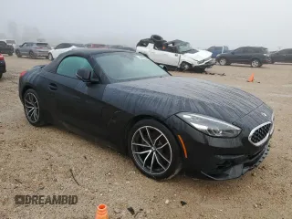 2022 BMW Z4 sDrive30i with VIN WBAHF3C04NWX42062, listed as a Copart auction lot 84463034 with 0 mi miles and Salvage Title. Bid and sale history available at carsss.com. Image 4.