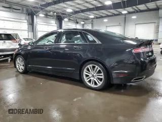 2014 Lincoln MKZ z VIN 3LN6L2JKXER819971, wystawiony jako Copart lot #49979115 z przebiegiem 132 602 mil mil oraz Szkoda całkowita • Salvage title. Historia ofert i sprzedaży dostępna na DreamBid. Obrazek 2.