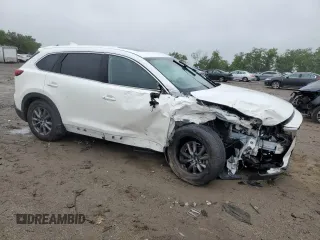 2021 Mazda CX-9 Touring with VIN JM3TCBCY1M0517709, listed as a Copart auction lot 57624945 with 64,081 mi miles and Salvage title. Bid and sale history available at DreamBid. Image 4.
