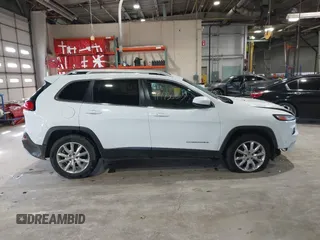 2015 Jeep Cherokee Limited with VIN 1C4PJMDS3FW728884, listed as a IAAI auction lot 41973663 with 112,719 mi miles. Bid and sale history available at carsss.com. Image 13.