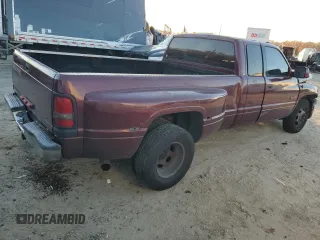 2001 Dodge Ram 3500 with VIN 1B7MC33671J599792, listed as a Copart auction lot 80102234 with 261,354 mi miles and Salvage Title. Bid and sale history available at carsss.com. Image 3.