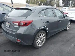 2014 Mazda 3 s Touring with VIN JM1BM1L35E1208952, listed as a IAAI auction lot 42121077 with 183,985 mi miles. Bid and sale history available at carsss.com. Image 4.