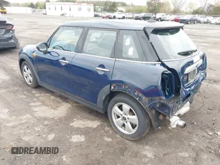 2015 MINI Hardtop 4 Door z VIN WMWXS5C54FT828442, wystawiony jako IAAI lot #42036692 z przebiegiem 88 224 mil mil oraz . Historia ofert i sprzedaży dostępna na DreamBid. Obrazek 3.