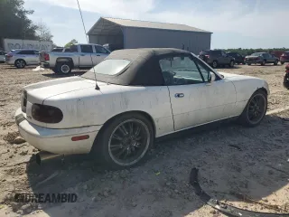 1991 Mazda MX-5 Miata Special Edition z VIN JM1NA3515M0231262, wystawiony jako Copart lot #57221675 z przebiegiem 241 670 mil mil oraz Szkoda całkowita • Salvage title. Historia ofert i sprzedaży dostępna na DreamBid. Obrazek 3.