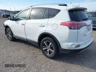 2018 Toyota RAV4 XLE with VIN JTMWFREV7JJ174483, listed as a IAAI auction lot 41597797 with 82,836 mi miles. Bid and sale history available at carsss.com. Image 3.