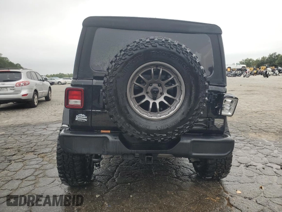 2023 Jeep Wrangler Sport with VIN 1C4HJXDN9PW638737, listed as a Copart auction lot 71367284 with 12,054 mi miles and Salvage Title. Bid and sale history available at DreamBid. Image 6.