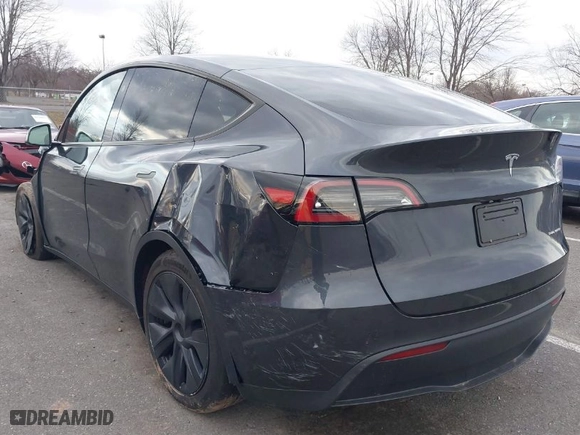 2024 Tesla Model Y Long Range with VIN 7SAYGDEE0RA330083, listed as a IAAI auction lot 41245099 with NaN miles. Bid and sale history available at carsss.com. Image 3.