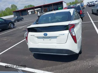 2017 Toyota Prius Two with VIN JTDKARFU7H3054054, listed as a IAAI auction lot 42028565 with 64,805 mi miles. Bid and sale history available at carsss.com. Image 16.
