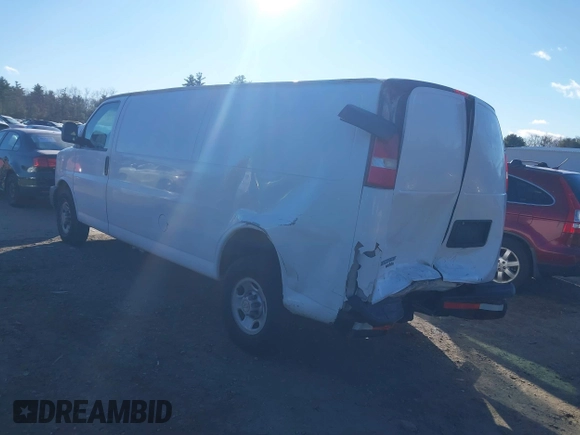 2014 Chevrolet Express Cargo Van with VIN 1GCWGGBA6E1122934, listed as a IAAI auction lot 40999693 with 194,565 mi miles. Bid and sale history available at carsss.com. Image 3.
