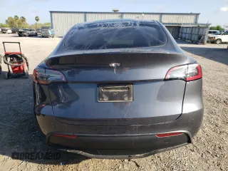 2023 Tesla Model Y z VIN 7SAYGDED8PF958836, wystawiony jako Copart lot #48893455 z przebiegiem 19 040 mil mil oraz Szkoda całkowita • Salvage title. Historia ofert i sprzedaży dostępna na DreamBid. Obrazek 6.