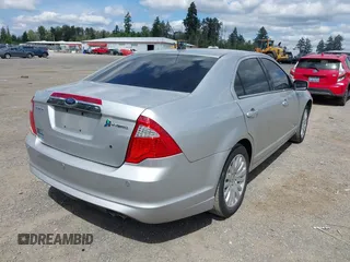 2012 Ford Fusion Hybrid with VIN 3FADP0L35CR440051, listed as a IAAI auction lot 42644284 with 89,087 mi miles and . Bid and sale history available at DreamBid. Image 4.