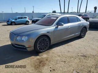 2014 Bentley Flying Spur z VIN SCBEC9ZA7EC090575, wystawiony jako Copart lot #57110315 z przebiegiem 19 083 mil mil oraz Szkoda całkowita • Salvage title. Historia ofert i sprzedaży dostępna na DreamBid. Obrazek 1.
