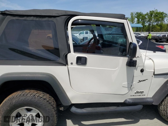 2005 Jeep Wrangler X with VIN 1J4FA39S75P332586, listed as a Copart auction lot 53334725 with 96,728 mi miles and Salvage title. Bid and sale history available at DreamBid. Image 10.