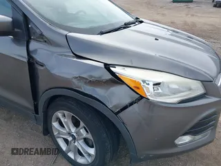 2013 Ford Escape SEL with VIN 1FMCU0HX0DUD71088, listed as a IAAI auction lot 41880044 with 155,439 mi miles. Bid and sale history available at carsss.com. Image 6.