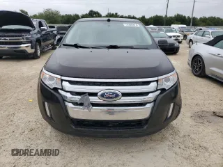 2013 Ford Edge Limited z VIN 2FMDK4KCXDBC33748, wystawiony jako Copart lot #74300874 z przebiegiem Nie podano mil oraz Szkoda całkowita • Salvage title. Historia ofert i sprzedaży dostępna na DreamBid. Obrazek 5.