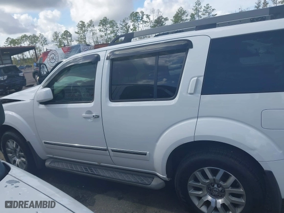 2012 Nissan Pathfinder SV with VIN 5N1AR1NN1CC616194, listed as a IAAI auction lot 40821219 with 104,698 mi miles. Bid and sale history available at carsss.com. Image 14.