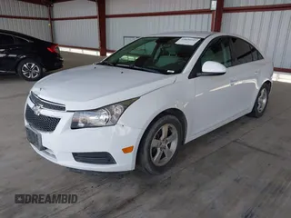 2014 Chevrolet Cruze 1LT with VIN 1G1PC5SB2E7226761, listed as a IAAI auction lot 42029133 with 153,738 mi miles and . Bid and sale history available at DreamBid. Image 2.
