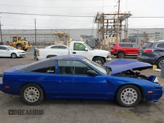 1990 Nissan 240SX z VIN JN1HS36P4LW126417, wystawiony jako IAAI lot #42065073 z przebiegiem 284 437 mil mil oraz . Historia ofert i sprzedaży dostępna na DreamBid. Obrazek 13.