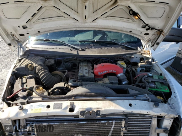 2002 Dodge Ram 3500 with VIN 3B7MC33C32M293036, listed as a Copart auction lot 77405204 with 0 mi miles and Salvage Title. Bid and sale history available at carsss.com. Image 12.