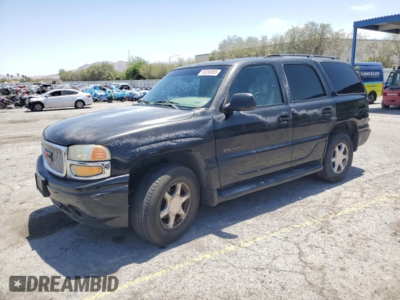 2002 GMC Yukon Denali z VIN 1GKEK63U62J241161, wystawiony jako Copart lot #58350085 z przebiegiem Nie podano mil oraz Szkoda całkowita • Salvage title. Historia ofert i sprzedaży dostępna na DreamBid. Obrazek 1.
