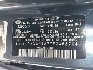 2015 Kia Optima EX with VIN 5XXGN4A77FG368704, listed as a IAAI auction lot 42174674 with 128,963 mi miles. Bid and sale history available at carsss.com. Image 9.