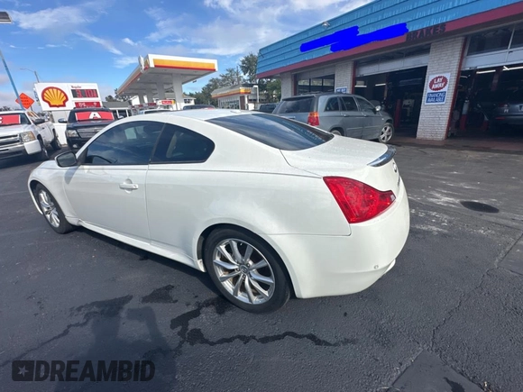 2015 Infiniti Q60 S Limited с VIN JN1CV6EK5FM871010, выставлен на аукционе Copart как лот 87052914 с пробегом 122 669 миль миль и Чистый • Clean title. История ставок и продаж доступна на DreamBid. Изображение 3.