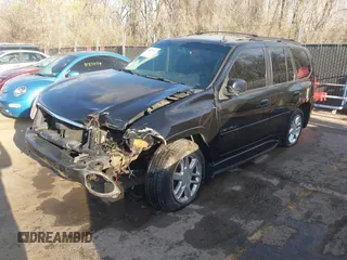 2006 GMC Envoy Denali with VIN 1GKET63M962355586, listed as a IAAI auction lot 41881023 with 235,506 mi miles. Bid and sale history available at carsss.com. Image 17.