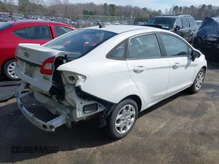 2013 Ford Fiesta S z VIN 3FADP4AJ9DM191664, wystawiony jako IAAI lot #41827196 z przebiegiem 111 982 mil mil oraz . Historia ofert i sprzedaży dostępna na DreamBid. Obrazek 4.