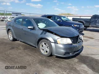 2013 Dodge Avenger SXT with VIN 1C3CDZCG5DN544909, listed as a IAAI auction lot 42274681 with 136,781 mi miles and . Bid and sale history available at DreamBid. Image 1.