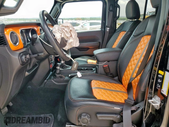 2021 Jeep Wrangler Unlimited Rubicon with VIN 1C4HJXFG5MW542260, listed as a Copart auction lot 59476655 with 19,870 mi miles and Salvage title. Bid and sale history available at DreamBid. Image 7.