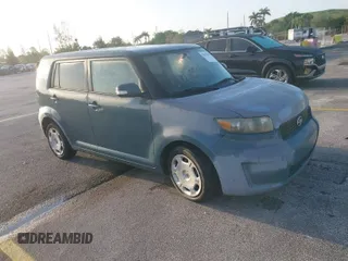 2008 Scion xB with VIN JTLKE50E581004400, listed as a IAAI auction lot 42012956 with 164,438 mi miles. Bid and sale history available at carsss.com. Image 1.