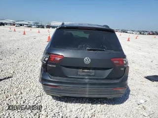 2018 Volkswagen Tiguan S z VIN 3VV1B7AX6JM147216, wystawiony jako Copart lot #52449345 z przebiegiem Nie podano mil oraz Szkoda całkowita • Salvage title. Historia ofert i sprzedaży dostępna na DreamBid. Obrazek 6.