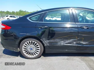 2016 Ford Fusion Titanium with VIN 3FA6P0K9XGR158234, listed as a IAAI auction lot 42043716 with 161,164 mi miles. Bid and sale history available at carsss.com. Image 18.