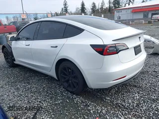 2023 Tesla Model 3 with VIN 5YJ3E1EA2PF612427, listed as a IAAI auction lot 41793756 with 17,913 mi miles and . Bid and sale history available at carsss.com. Image 3.