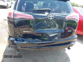 2018 Toyota RAV4 XLE with VIN 2T3WFREV3JW468450, listed as a IAAI auction lot 42528560 with 77,513 mi miles and . Bid and sale history available at DreamBid. Image 6.