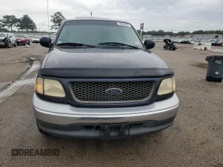 2000 Ford F-150 XL with VIN 1FTRX17L7YNC24292, listed as a Copart auction lot 58852925 with 213,318 mi miles and Salvage title. Bid and sale history available at DreamBid. Image 5.
