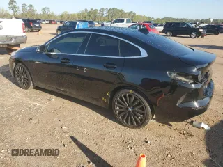 2021 BMW 2 Series 228i with VIN WBA53AK08M7H30753, listed as a Copart auction lot 49979925 with 65,784 mi miles and Salvage title. Bid and sale history available at DreamBid. Image 2.