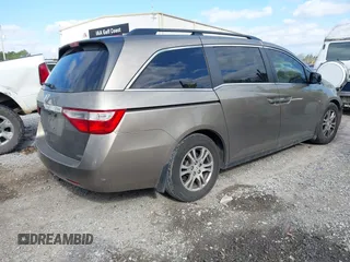 2013 Honda Odyssey EX z VIN 5FNRL5H40DB038886, wystawiony jako IAAI lot #41761738 z przebiegiem 244 107 mil mil oraz . Historia ofert i sprzedaży dostępna na DreamBid. Obrazek 4.