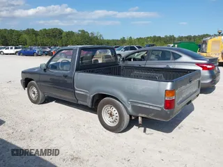 1992 Toyota Pickup with VIN JT4RN81AXN0100712, listed as a IAAI auction lot 42016872 with 124,997 mi miles and . Bid and sale history available at DreamBid. Image 3.