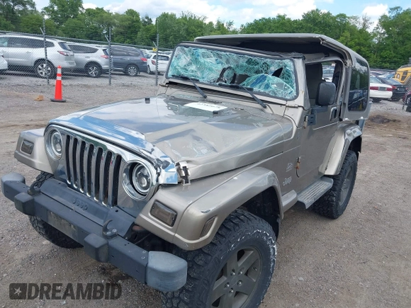 2004 Jeep Wrangler Sahara with VIN 1J4FA59S54P740417, listed as a IAAI auction lot 42382078 with 200,108 mi miles and . Bid and sale history available at DreamBid. Image 6.
